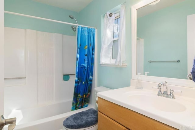 bathroom featuring shower / tub combo with curtain and vanity