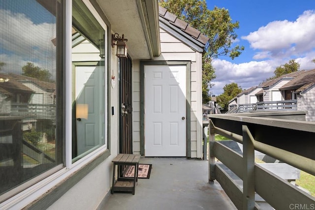 entrance to property featuring a balcony