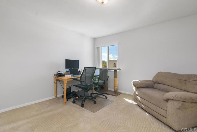 office with carpet floors and baseboards