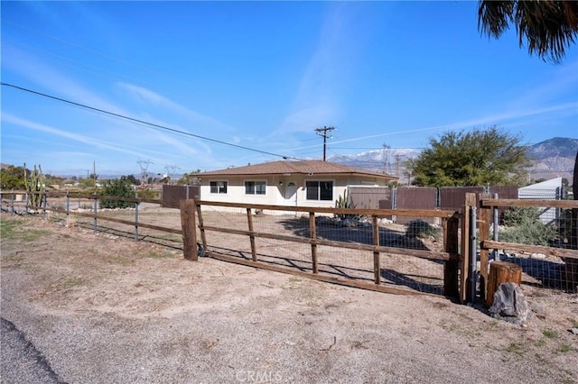 exterior space with a gate and fence