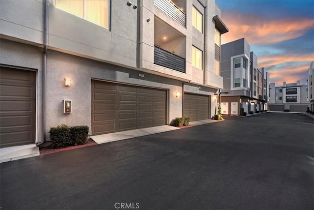 exterior space with a garage