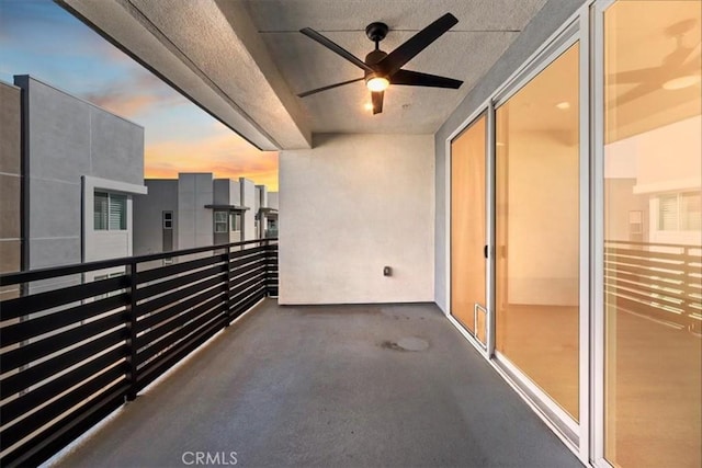 balcony featuring ceiling fan