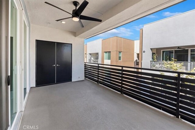 balcony featuring ceiling fan