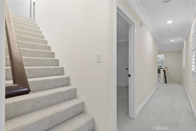 stairs featuring recessed lighting, baseboards, carpet floors, and ornamental molding