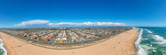 aerial view with a view of the beach and a water view