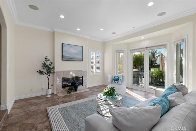 living room with crown molding, a fireplace, baseboards, and arched walkways