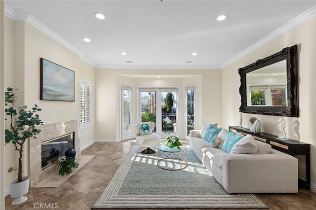 living area with recessed lighting, baseboards, a high end fireplace, and ornamental molding