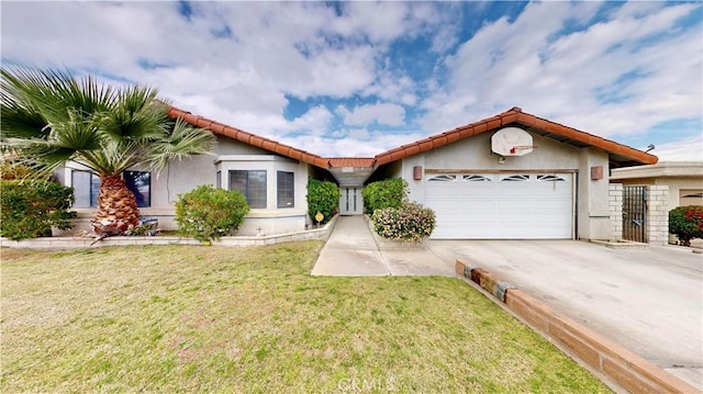 view of front of home featuring a front lawn, a tile roof, stucco siding, a garage, and driveway