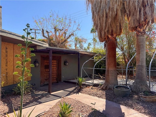 view of patio featuring fence