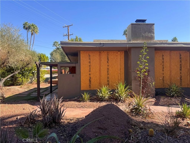 exterior space with a chimney