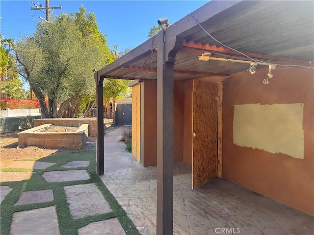 view of patio / terrace with fence