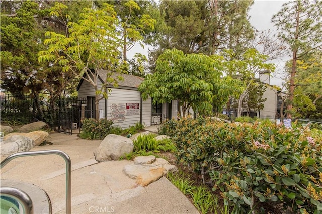 view of front of property featuring fence