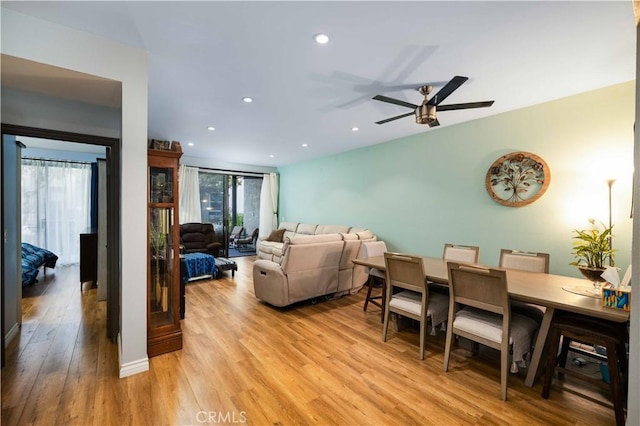 living room with a ceiling fan, recessed lighting, and light wood-style flooring