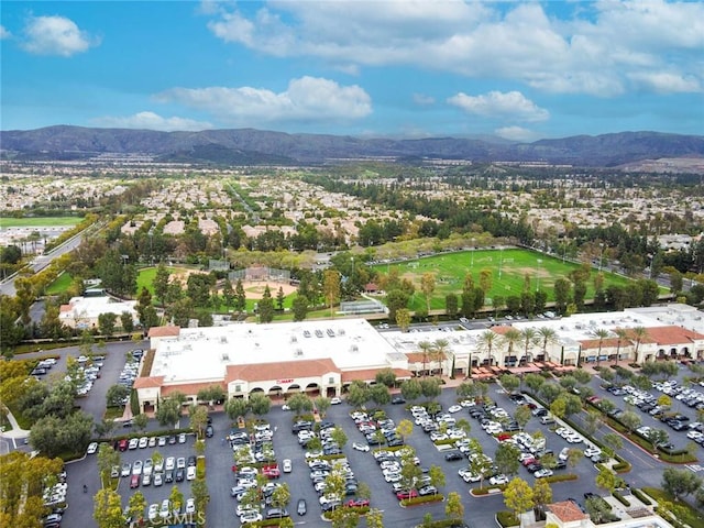 aerial overview of property's location featuring a mountain backdrop
