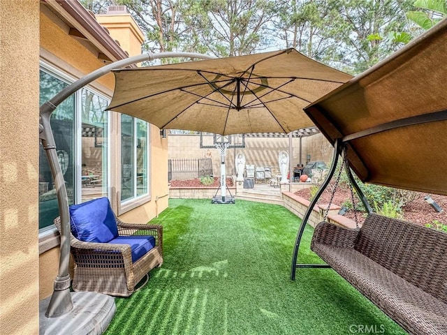 view of yard featuring a patio area