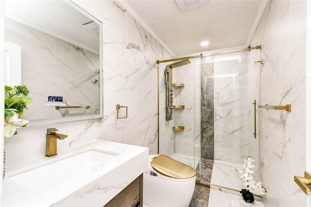 bathroom with tile walls, a marble finish shower, toilet, crown molding, and vanity