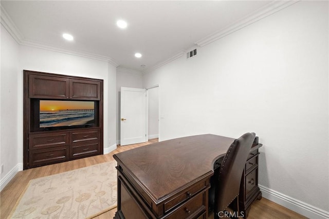 home office featuring light wood-type flooring, recessed lighting, crown molding, and baseboards