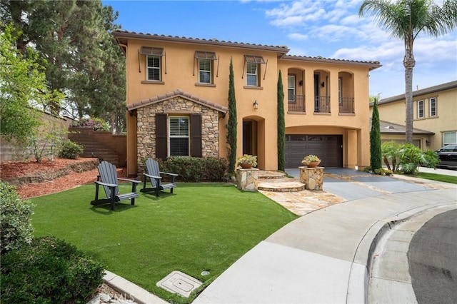 mediterranean / spanish home with driveway, stucco siding, a garage, a balcony, and stone siding