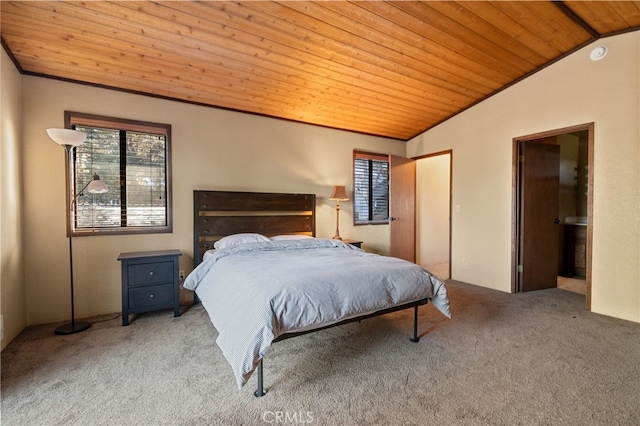 bedroom featuring lofted ceiling, carpet flooring, wood ceiling, and connected bathroom