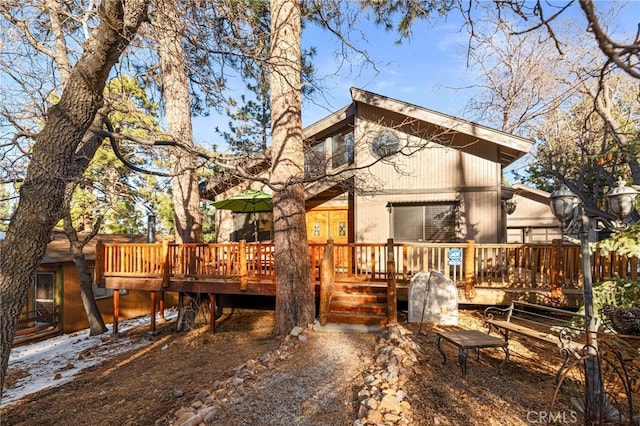 rear view of house with a deck