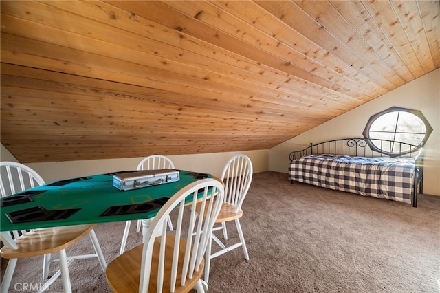 carpeted bedroom featuring vaulted ceiling and wooden ceiling