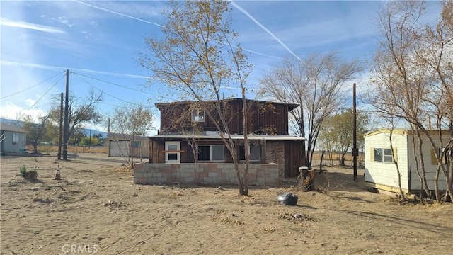 exterior space with an outbuilding