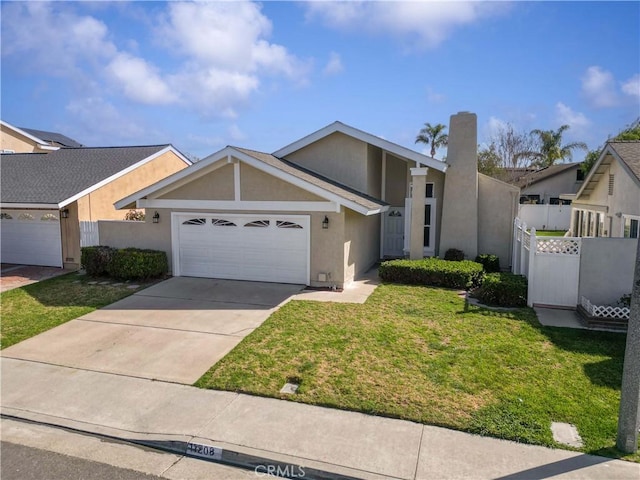 view of front of home featuring a garage, concrete driveway, fence, and stucco siding