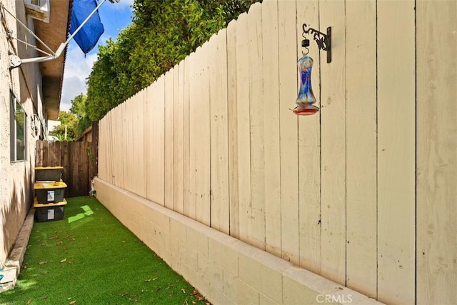 view of yard with fence