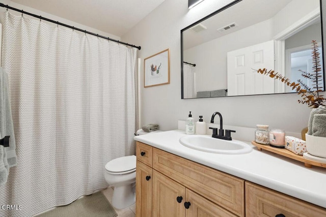 bathroom with visible vents, toilet, tile patterned floors, curtained shower, and vanity