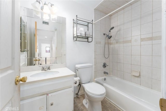 full bathroom featuring toilet, washtub / shower combination, vanity, and visible vents