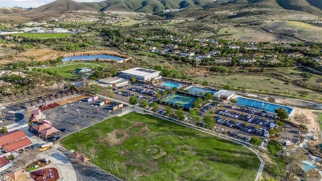 bird's eye view with a water and mountain view