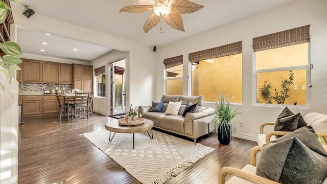 living room with recessed lighting, baseboards, wood finished floors, and a ceiling fan