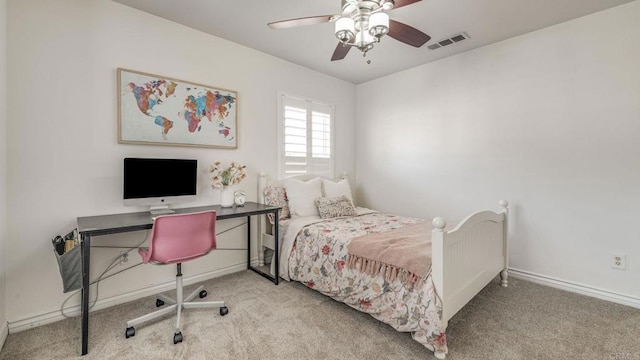 bedroom featuring visible vents, baseboards, carpet, and ceiling fan