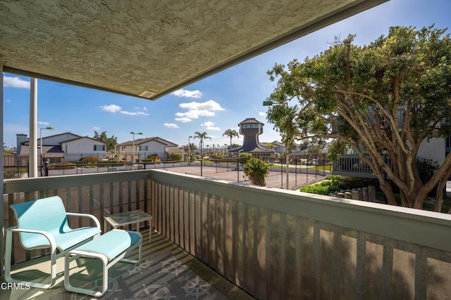 balcony featuring a residential view