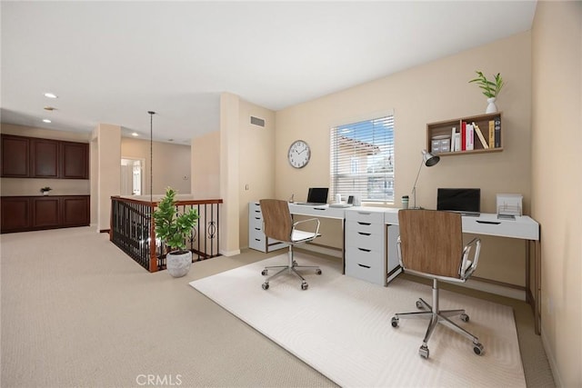 home office featuring light colored carpet, visible vents, baseboards, and recessed lighting