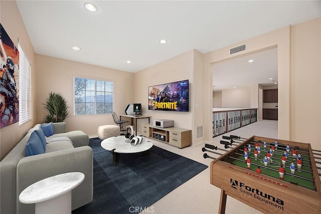 game room with carpet floors, visible vents, and recessed lighting