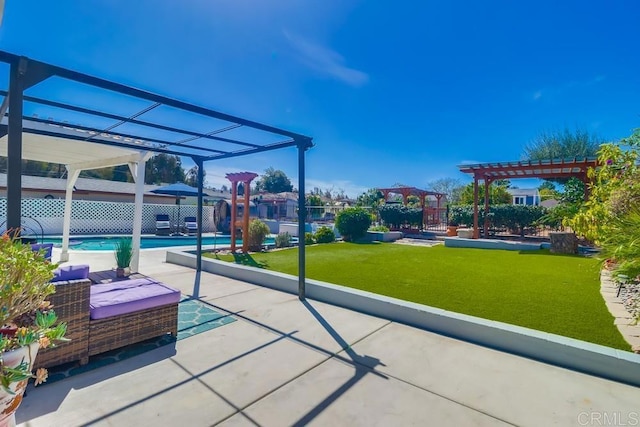 view of patio / terrace featuring fence and a pergola