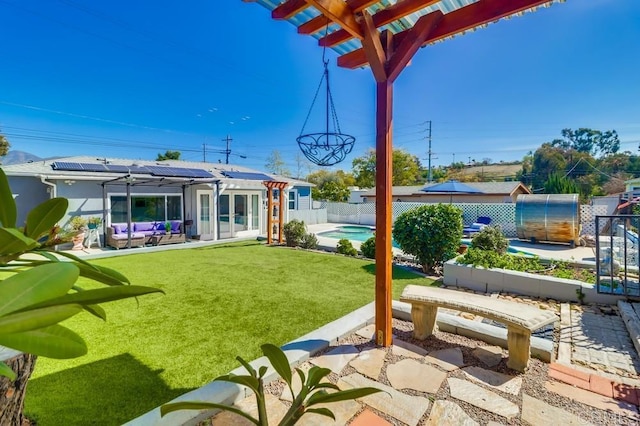 exterior space with a fenced in pool, a fenced backyard, an outdoor living space, and a pergola