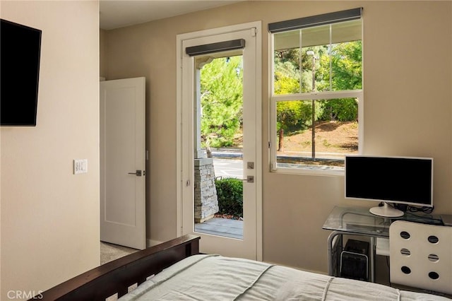 bedroom featuring access to exterior