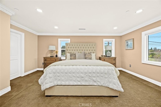 bedroom with baseboards, carpet flooring, visible vents, and crown molding