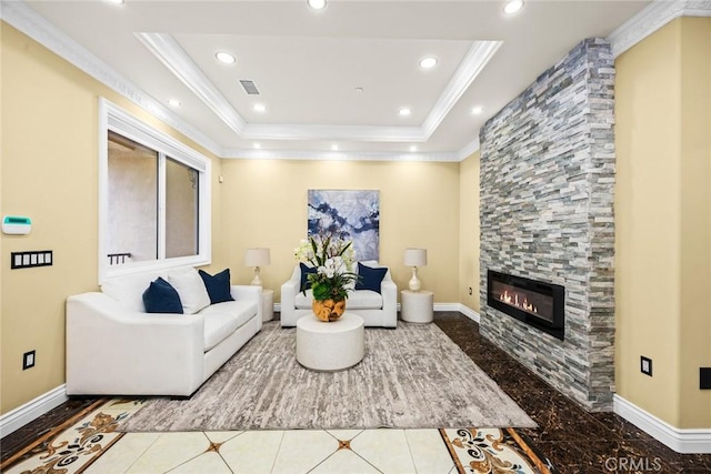 living area with recessed lighting, a fireplace, crown molding, and baseboards