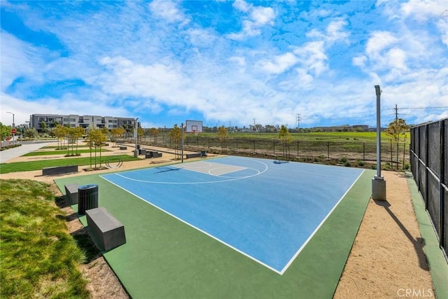 view of sport court with community basketball court and fence