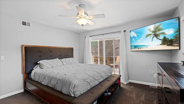 bedroom featuring dark colored carpet, access to outside, visible vents, and baseboards