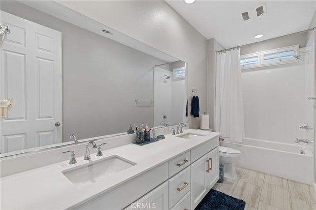 29945 Urtica Ct, Menifee, CA 92584 - full bath with shower / bath combo with shower curtain, a sink, double vanity, and toilet