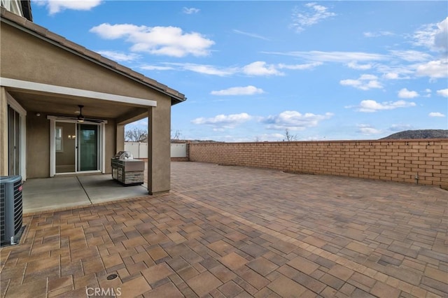 29945 Urtica Ct, Menifee, CA 92584 - view of patio with central AC and a fenced backyard