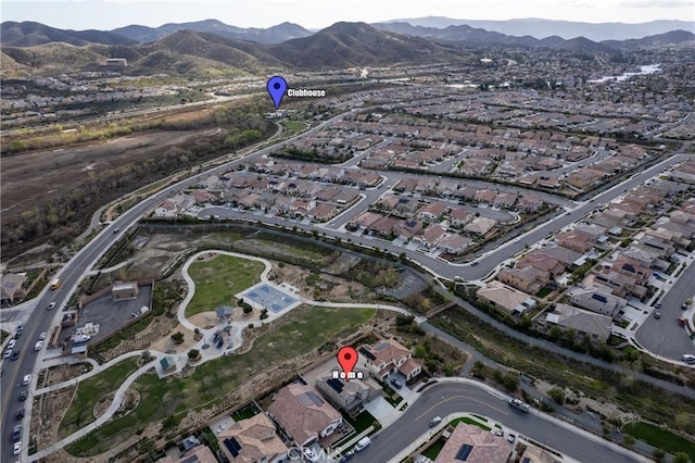 drone / aerial view with a residential view and a mountain view