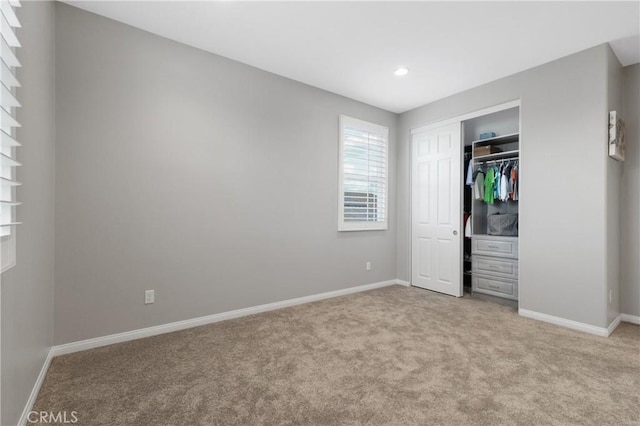 29945 Urtica Ct, Menifee, CA 92584 - unfurnished bedroom with recessed lighting, baseboards, a closet, and light colored carpet