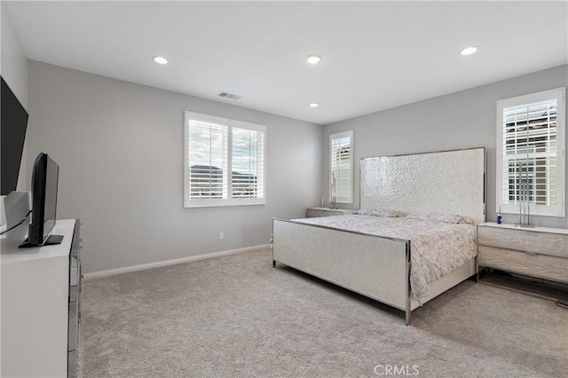 bedroom featuring recessed lighting, baseboards, visible vents, and carpet flooring