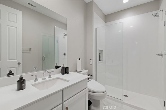 29945 Urtica Ct, Menifee, CA 92584 - full bathroom featuring a shower stall, visible vents, toilet, and vanity