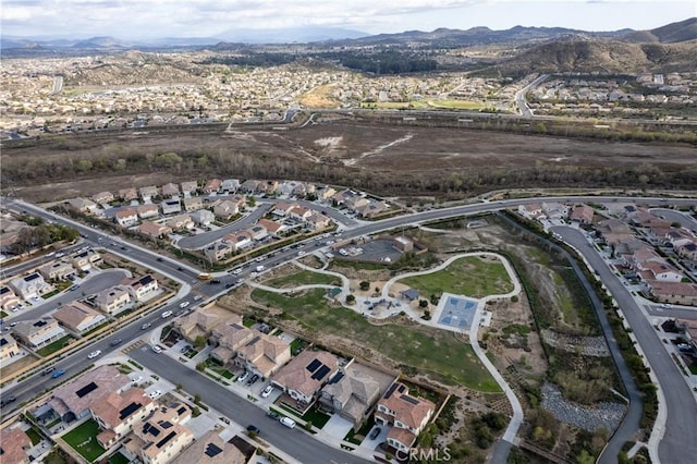 bird's eye view with a residential view and a mountain view